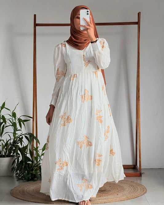 Embroidered pleated gown